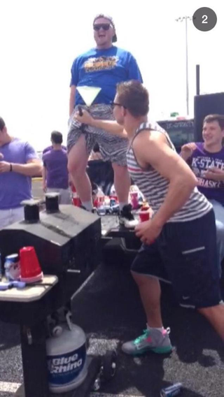 Illustration for article titled Gronk Tailgates K-State Spring Game, Is Amused By Beer Bong In Pants